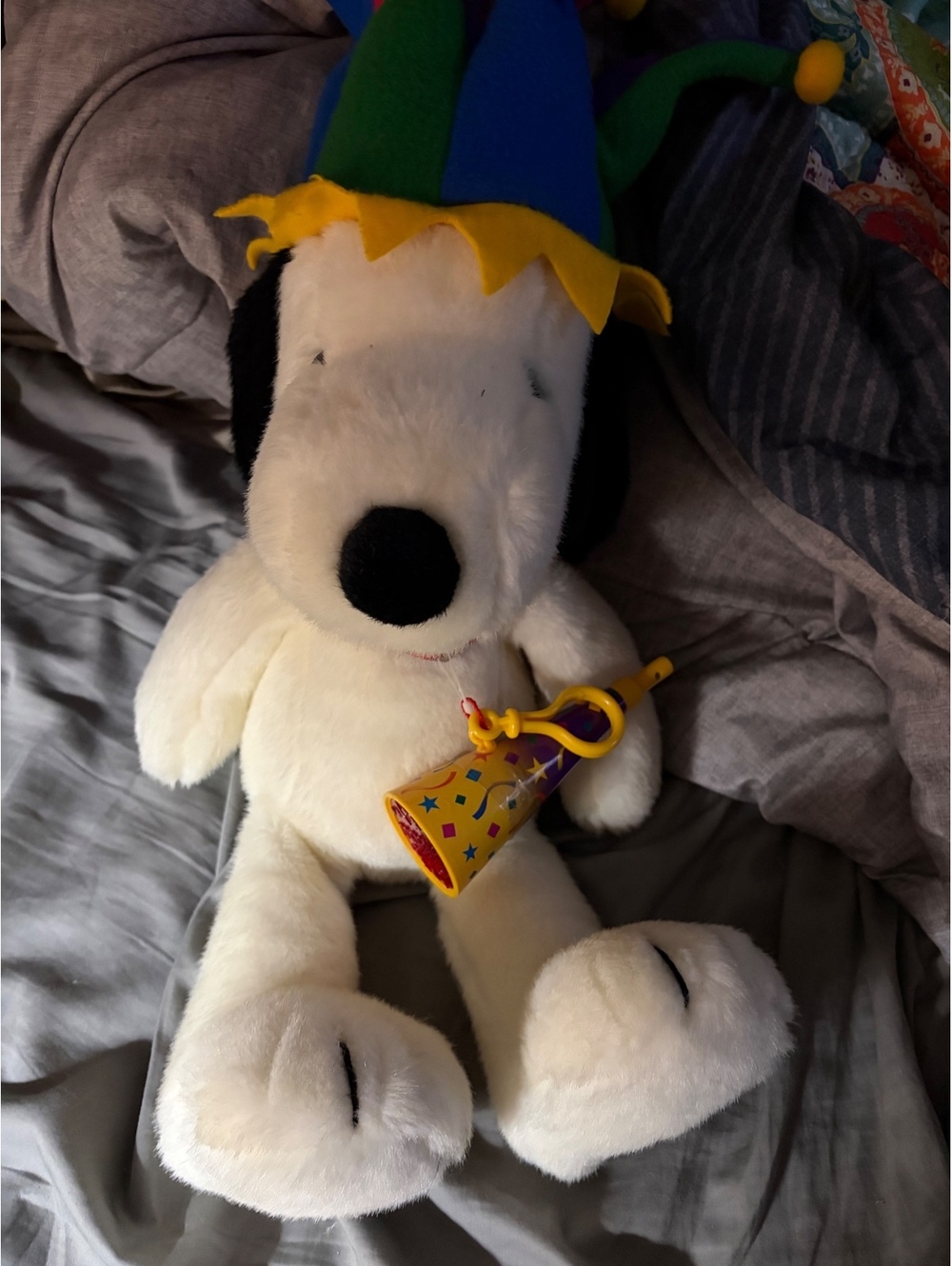 Peanuts Snoopy Plush Toy with Colorful Jester Hat and Party Horn